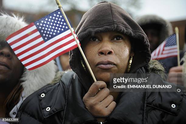 Democratic presidential candidate Illinois Senator Barack Obama supporters hold US flags during a rally at Widener University in Chester,...