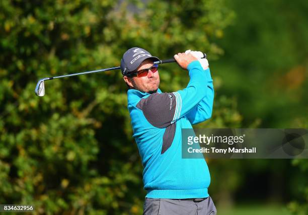 Benn Barham of Pentland Golf plays his first shot on the 1st tee during the Golfbreaks.com PGA Fourball Championship - Day 3 at Whittlebury Park Golf...