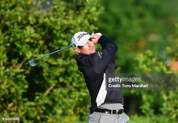 Ryan O'Neill of Penwortham Golf Club plays his first shot on the 1st tee during the Golfbreaks.com PGA Fourball Championship - Day 3 at Whittlebury...