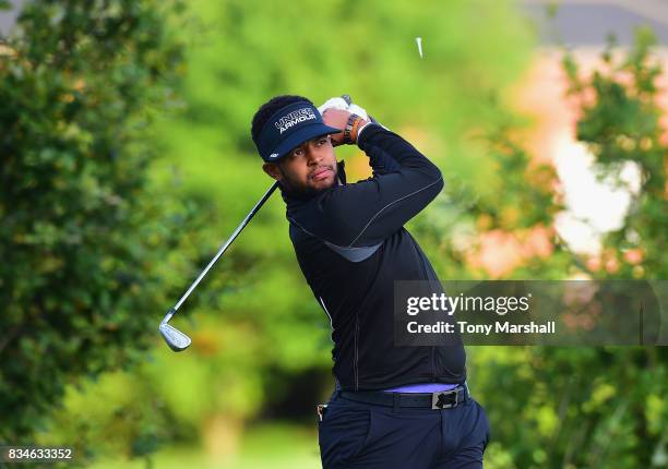 Colton Davis of Cooden Beach Golf Club plays his first shot on the 1st tee during the Golfbreaks.com PGA Fourball Championship - Day 3 at Whittlebury...