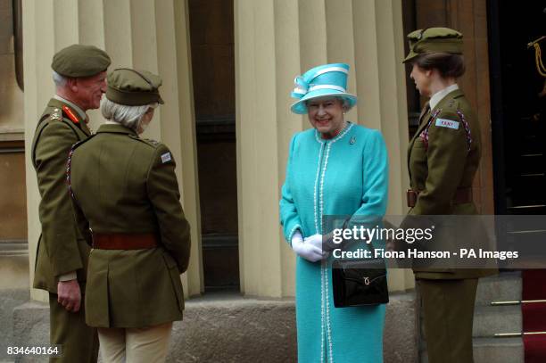 The Queen and The Princess Royal, who is Commandant-in-Chief of the First Aid Nursing Yeomany, arrives to inspect vintage vehicles used by the...