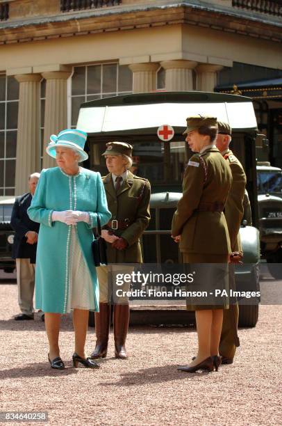 The Queen and The Princess Royal, who is Commandant-in-Chief of the First Aid Nursing Yeomany, arrives to inspect vintage vehicles used by the...
