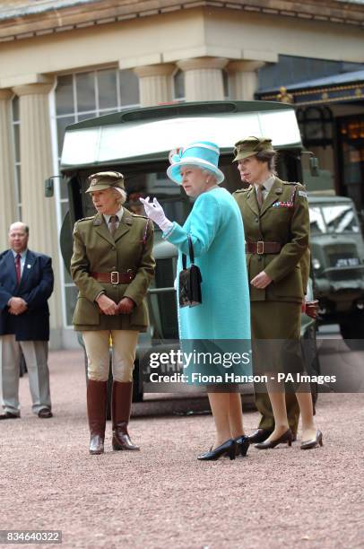 The Queen and The Princess Royal, who is Commandant-in-Chief of the First Aid Nursing Yeomany, arrives to inspect vintage vehicles used by the...