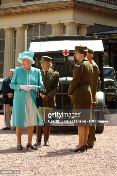 The Queen and The Princess Royal, who is Commandant-in-Chief of the First Aid Nursing Yeomany, arrives to inspect vintage vehicles used by the...