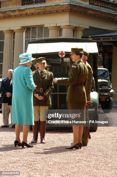 The Queen and The Princess Royal, who is Commandant-in-Chief of the First Aid Nursing Yeomany, arrives to inspect vintage vehicles used by the...