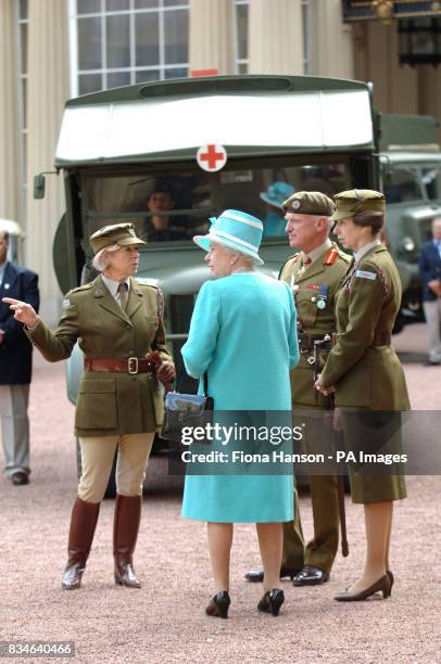 The Queen and The Princess Royal, who is Commandant-in-Chief of the First Aid Nursing Yeomany, arrives to inspect vintage vehicles used by the...
