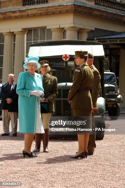The Queen and The Princess Royal, who is Commandant-in-Chief of the First Aid Nursing Yeomany, arrives to inspect vintage vehicles used by the...