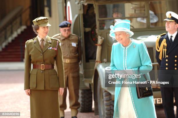 The Queen and The Princess Royal, who is Commandant-in-Chief of the First Aid Nursing Yeomany, arrives to inspect vintage vehicles used by the...
