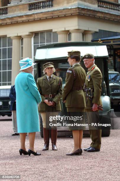 The Queen and The Princess Royal, who is Commandant-in-Chief of the First Aid Nursing Yeomany, arrives to inspect vintage vehicles used by the...