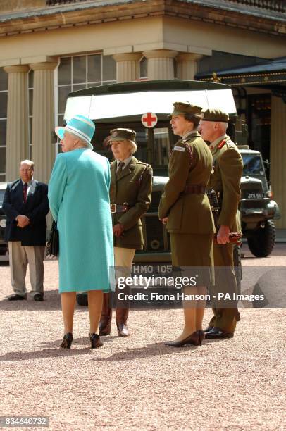 The Queen and The Princess Royal, who is Commandant-in-Chief of the First Aid Nursing Yeomany, arrives to inspect vintage vehicles used by the...