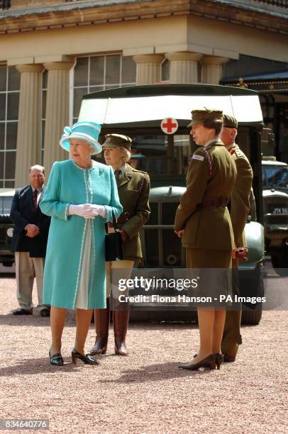The Queen and The Princess Royal, who is Commandant-in-Chief of the First Aid Nursing Yeomany, arrives to inspect vintage vehicles used by the...