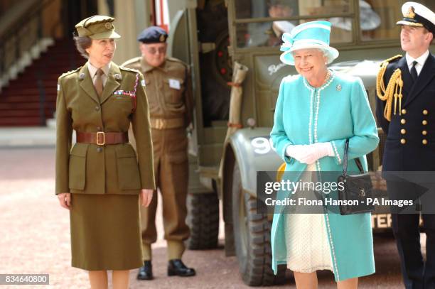 The Queen and The Princess Royal, who is Commandant-in-Chief of the First Aid Nursing Yeomany, arrives to inspect vintage vehicles used by the...
