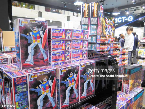 Products lining the shelf include ones that will be offered for the first time in many years at Gundam Base Tokyo on August 17, 2017 in Tokyo, Japan....