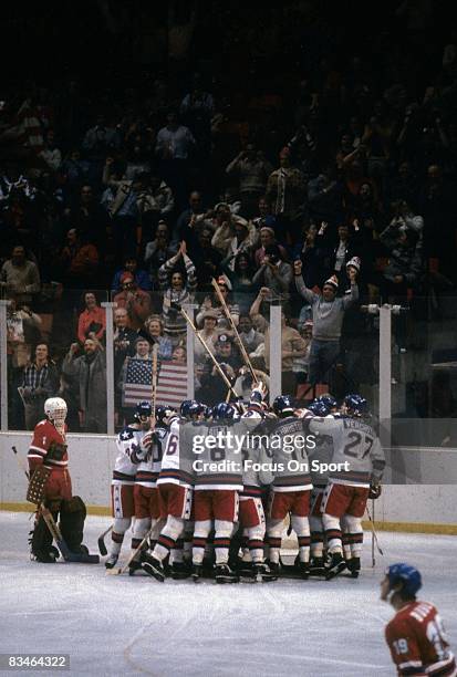 General view of teams from the United States and the Soviet Union shaking hands after the semifinal hockey game during the Winter Olympics in Lake...