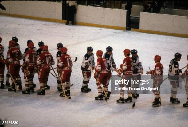 General view of teams from the United States and the Soviet Union shaking hands after the semifinal hockey game during the Winter Olympics in Lake...