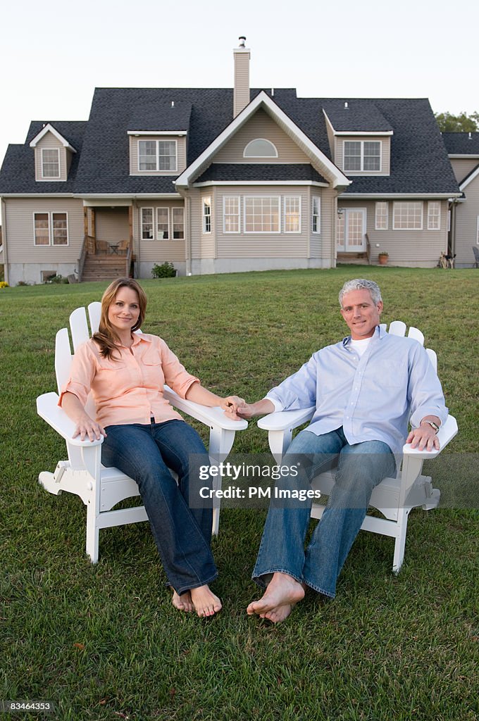 Man and Woman with new house