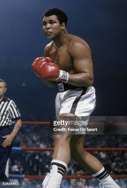 Muhammad Ali looks for an opening against Alfredo Evangelista, not pictured during a WBC/WBA heavyweight championship fight on May 16, 1977 at the...