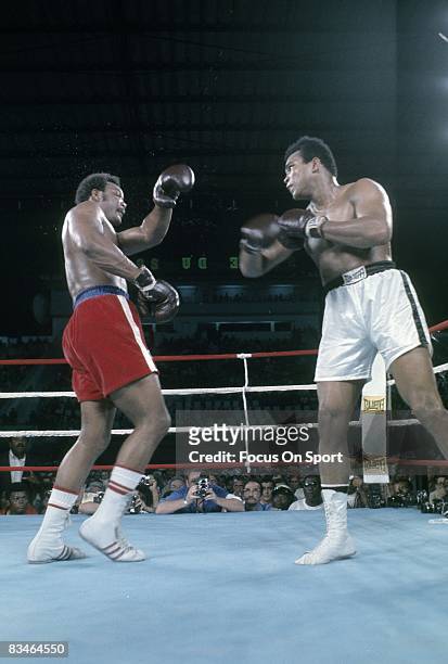 Muhammad Ali in action throw a punch at George Foreman in the Heavyweight Championship fight October 30, 1974 in Kinshasa, Zaire. Ali won and got...