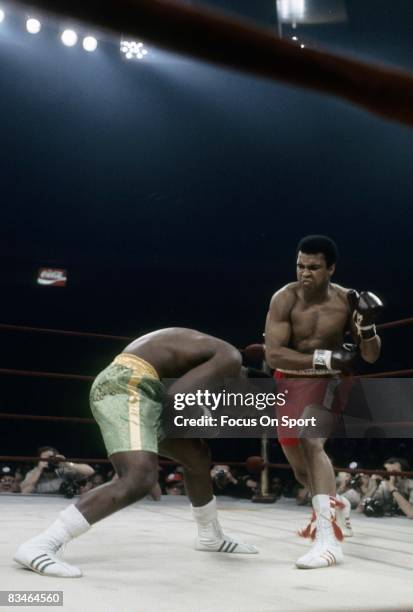 Muhammad Ali throws a punch at Joe Frazier during the WBC/WBA heavyweight title fight March 8, 1971 at Madison Square Garden in New York, New York.