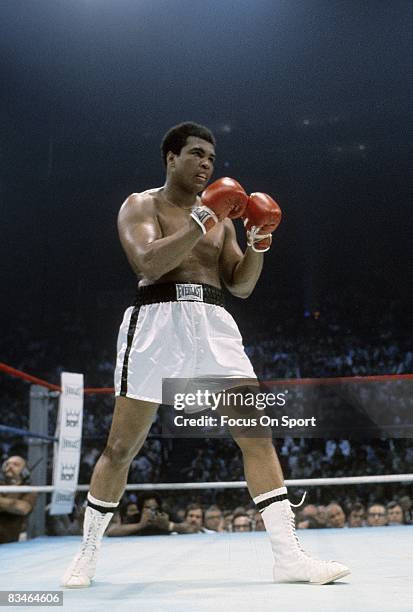 Muhammad Ali in action during a heavyweight fight, circa late 1970's.