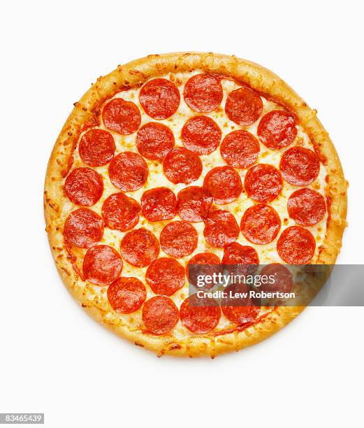 whole pepperoni pizza - elevated view circle stock pictures, royalty-free photos & images