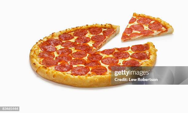 pepperoni pizza with slice - pizza slice stock pictures, royalty-free photos & images