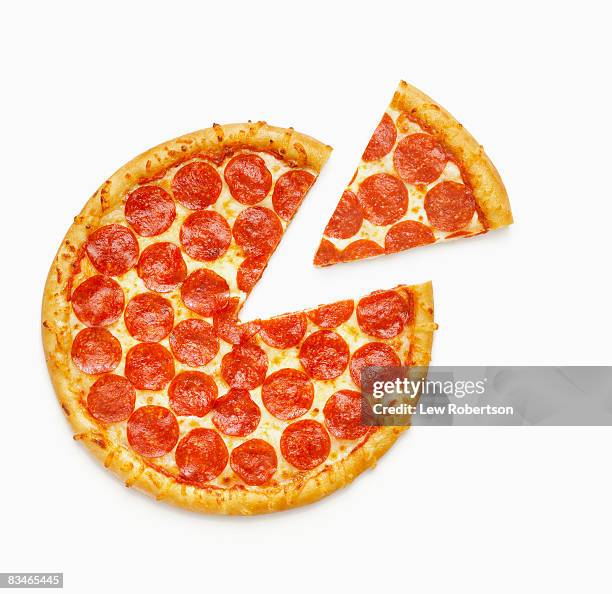 pepperoni pizza with slice - pepperoni pizza stock pictures, royalty-free photos & images