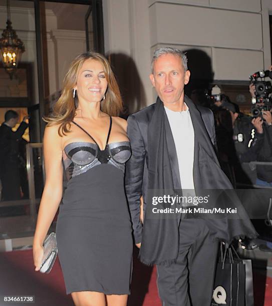 Elizabeth Hurley and Patrick Cox are seen leaving the GQ Awards on September 02, 2008 in London, England.