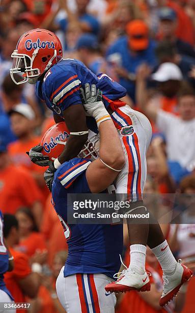 Jeffery Demps of the Florida Gators celebrates after scoring a touchdown in a game against the Kentucky Wildcats at Ben Hill Griffin Stadium on...