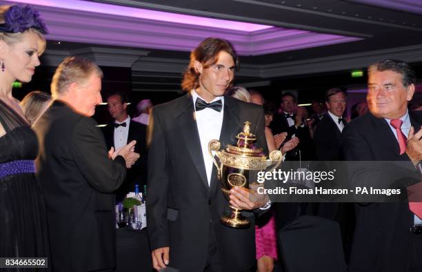 Rafael Nadal of Spain who beat Roger Federer to become a first time winner of the Men's Singles Wimbledon Tennis Championship arriving to a standing...