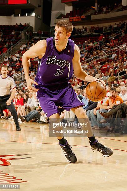 Spencer Hawes of the Sacramento Kings drives the ball up court during the preseason game against the Houston Rockets on October 17, 2008 at the...