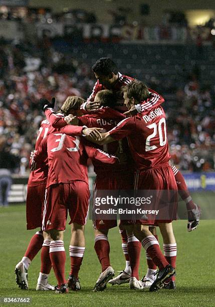 Justin Mapp, Stephen King, Chris Rolfe, Diego Gutierrez and Brian McBride of the Chicago Fire celebrate Rolfe's goal against the New York Red Bulls...