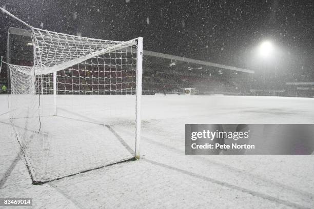 The pitch at Sixfields lies covered in snow prior to the postponement of the Coca Cola League One match between Northampton Town and Colchester...