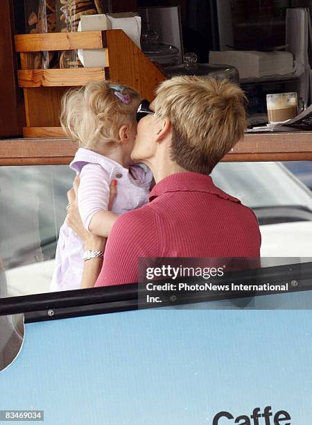 Presenter Jessica Rowe sits with her daughter Allegra Overton near her Rose Bay home on February 14, 2008 in Sydney, Australia.