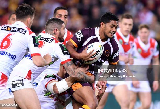 Anthony Milford of the Broncos attempts to breaks through the defence during the round 24 NRL match between the Brisbane Broncos and the St George...