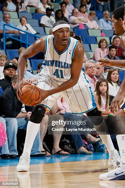 James Posey of the New Orleans Hornets surveys the court against Danny Granger of the Indiana Pacers during the preseason game on October 21, 2008 at...