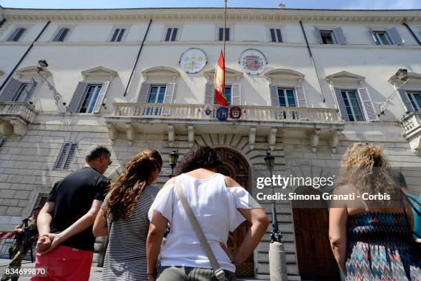 Spanish citizens on vacation in Rome bring flowers in front of the Spanish embassy in a sign of condolences to all the victims of the terrorist...