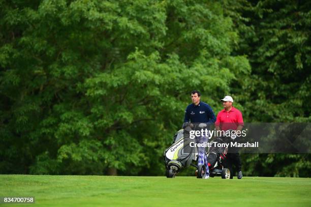 Richard O'Hanlon of St Kew Golf Club and Michael Watson of Wessex Golf Centre walk on the 6th green during the Golfbreaks.com PGA Fourball...