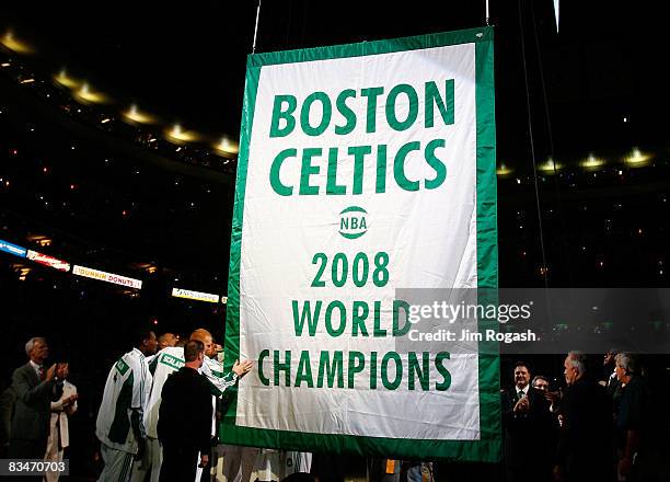 The Boston Celtics raise 2008 World Championship banner during the 2008 NBA World Championship ceremony before a game against the Cleveland Cavaliers...