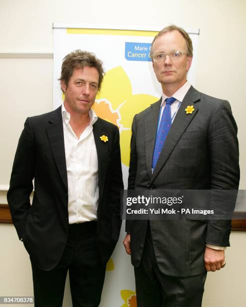 Ambassador for the charity Hugh Grant, with Thomas Hughes-Hallett, Marie Curie Chief Executive during a photocall to announce an NHS allocation of 15...