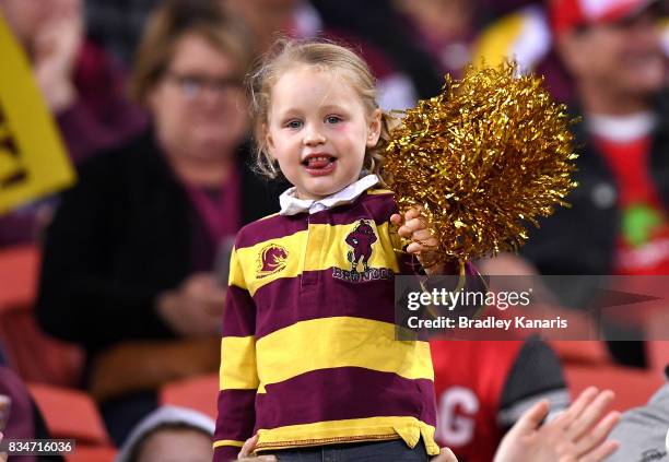 Young Broncos fan shows her support during the round 24 NRL match between the Brisbane Broncos and the St George Illawarra Dragons at Suncorp Stadium...