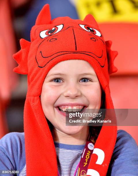 Young Dragons fan shows her support during the round 24 NRL match between the Brisbane Broncos and the St George Illawarra Dragons at Suncorp Stadium...