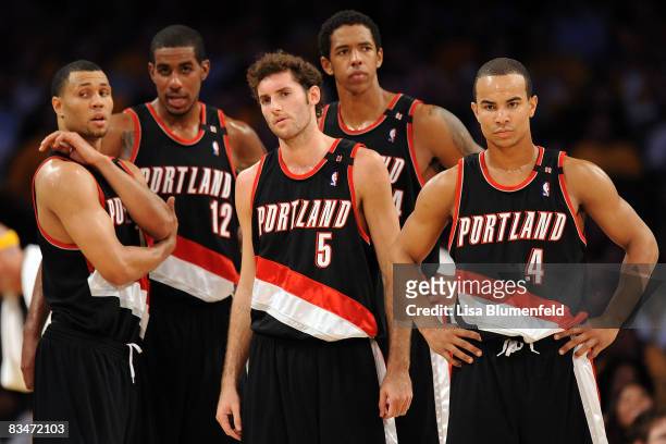 Brandon Roy, LaMarcus Aldridge, Rudy Fernandez, Channing Frye and Jerryd Bayless of the Portland Trail Blazers look on in the fourth quarter against...