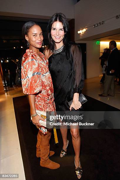 Actress Joy Bryant and actress Angie Harmon attend the Vogue and Step Up Women's Network Evening of Fashion at Bally on October 28, 2008 in Beverly...
