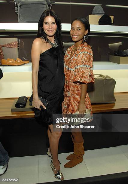 Angie Harmon and Joy Bryant at the Vogue and Step Up Women's Network fashion event at Bally on October 28, 2008 in Beverly Hills, California.