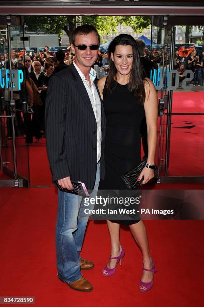 John Simm and his wife Kate Magowan arrive for the European premiere of 'The Dark Knight' at the Odeon West End Cinema, Leicester Square, London.