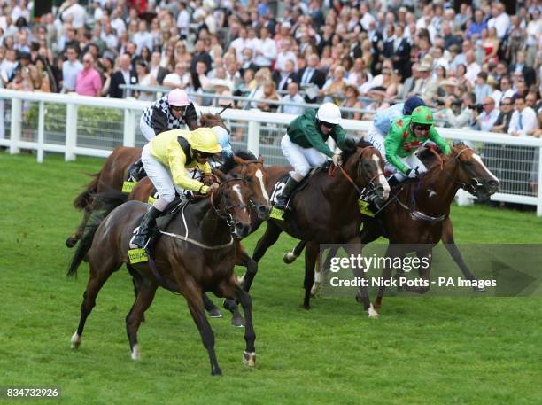 Laa Rayb ridden by Royston French clears the field in the final furlong to win The totesport International Stakes Class 2 at Ascot Racecourse,...