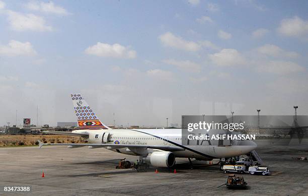 Pakistan International Airlines aeroplane parks on a landing strip at Karachi airport in Karachi on October 29, 2008. Pakistan International Airlines...