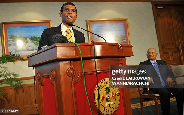 Maldivian Democratic Party founder and president-elect, Mohamed 'Anni' Nasheed speaks to reporters at the President's Office as outgoing President...