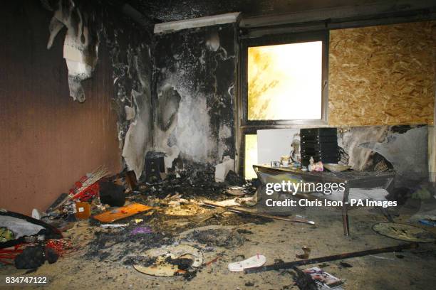 The scene inside the lounge of Paul Hicks' home in Christchurch, Dorset where he and his family escaped with their lives from a fire in the middle of...